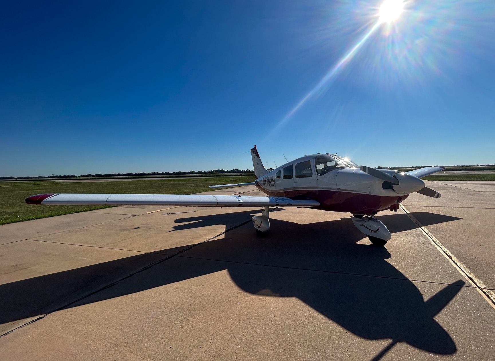 A photo of an aircraft in Hesston College Aviation's fleet of training aircraft: a Piper Archer II