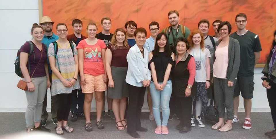 photo - Japan group with atomic bomb survivor.
