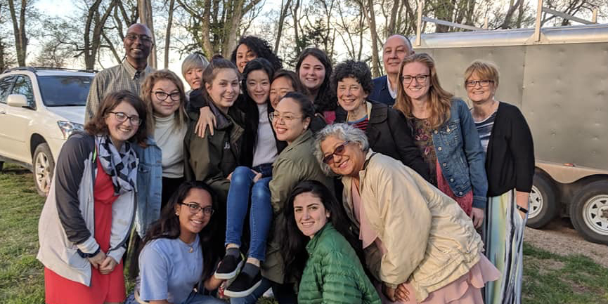 photo: friends gather around Risa Fukaya to celebrate her baptism