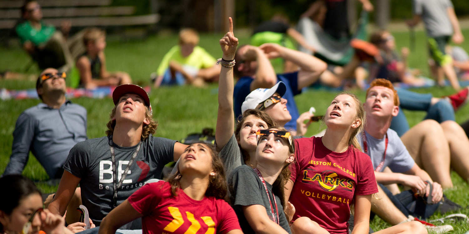 photo - Hesston College students view the totality of the solar eclipse.