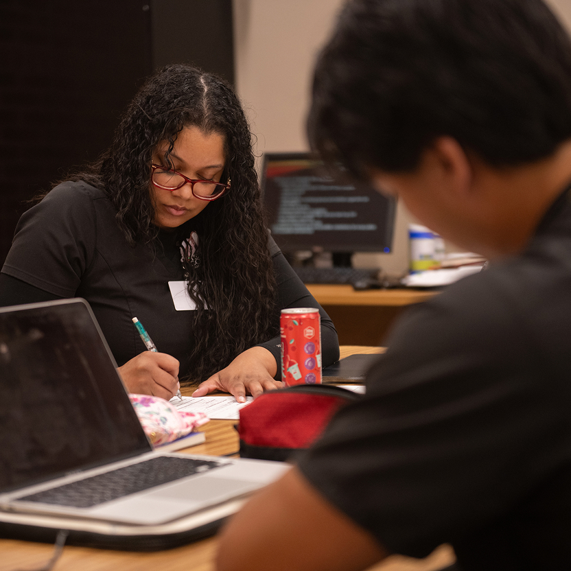 Nursing student taking notes